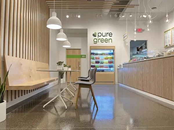 Interior seating and pickup counter at Pure Green Madison