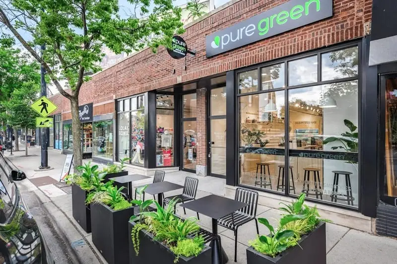 The sidewalk patio outside Pure Green Lakeview on North Broadway