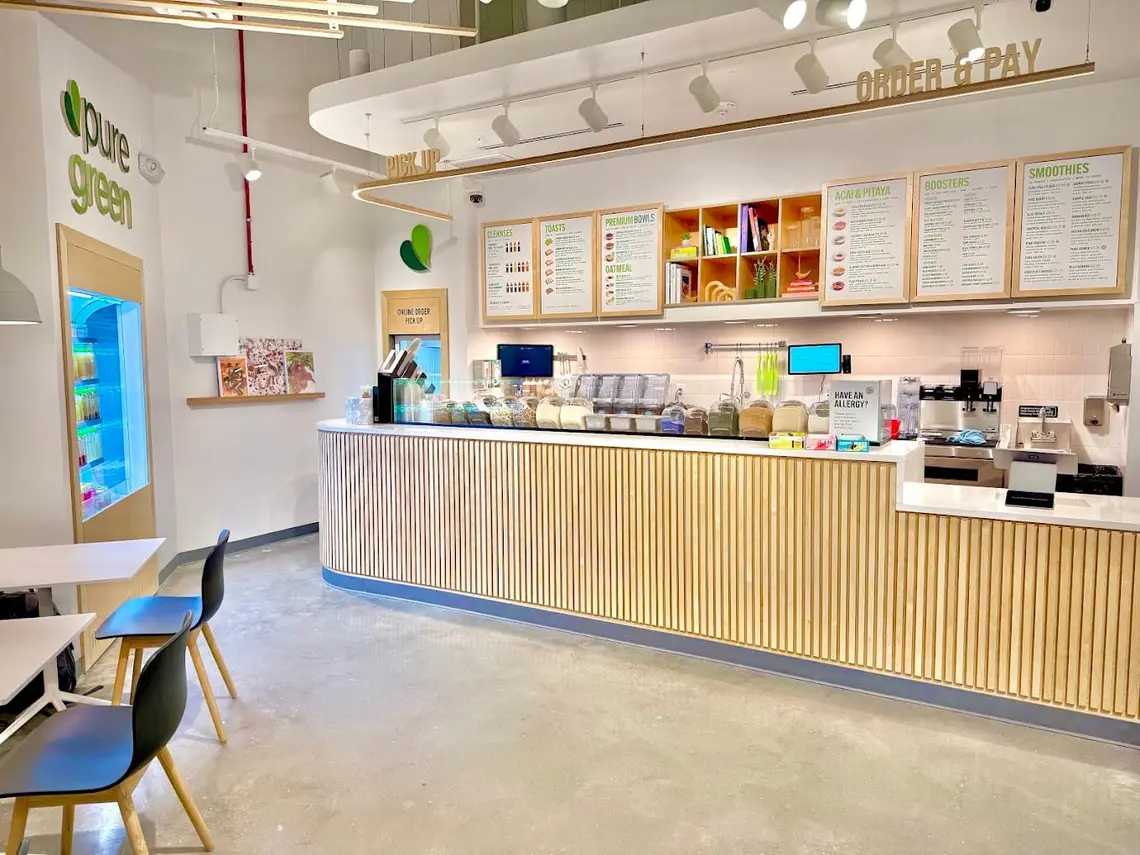 The counter and menu boards at Pure Green Bethesda
