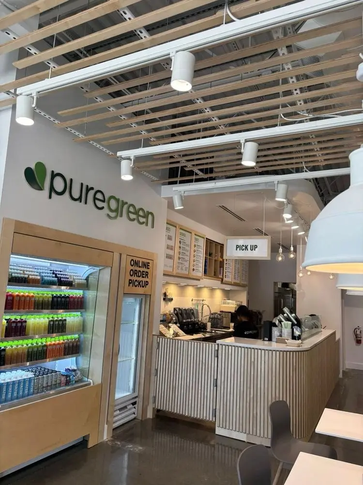 The order and pickup counter inside Pure Green Miami Lakes