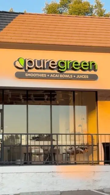 Pure Green Granite Bay storefront sign on Douglas Boulevard reading smoothies, acai bowls and juices
