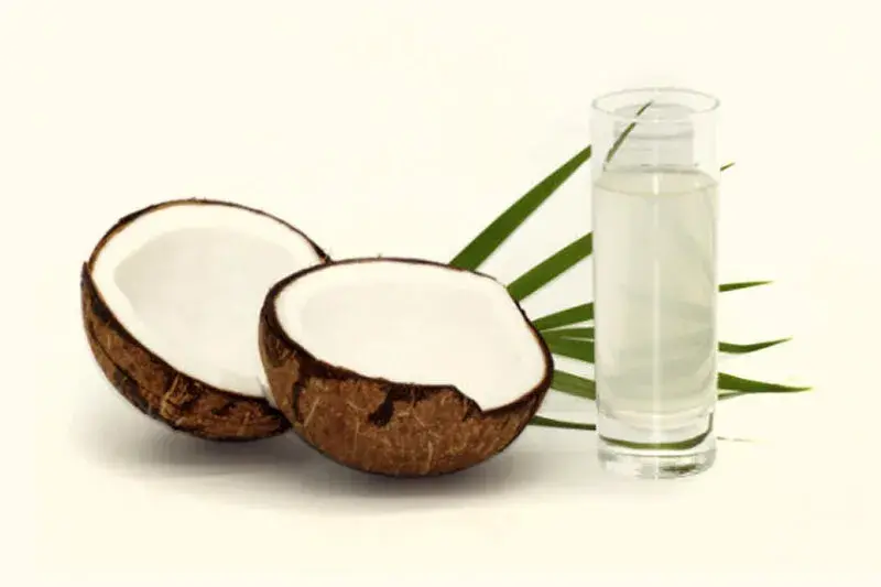 Coconut water served beside a coconut