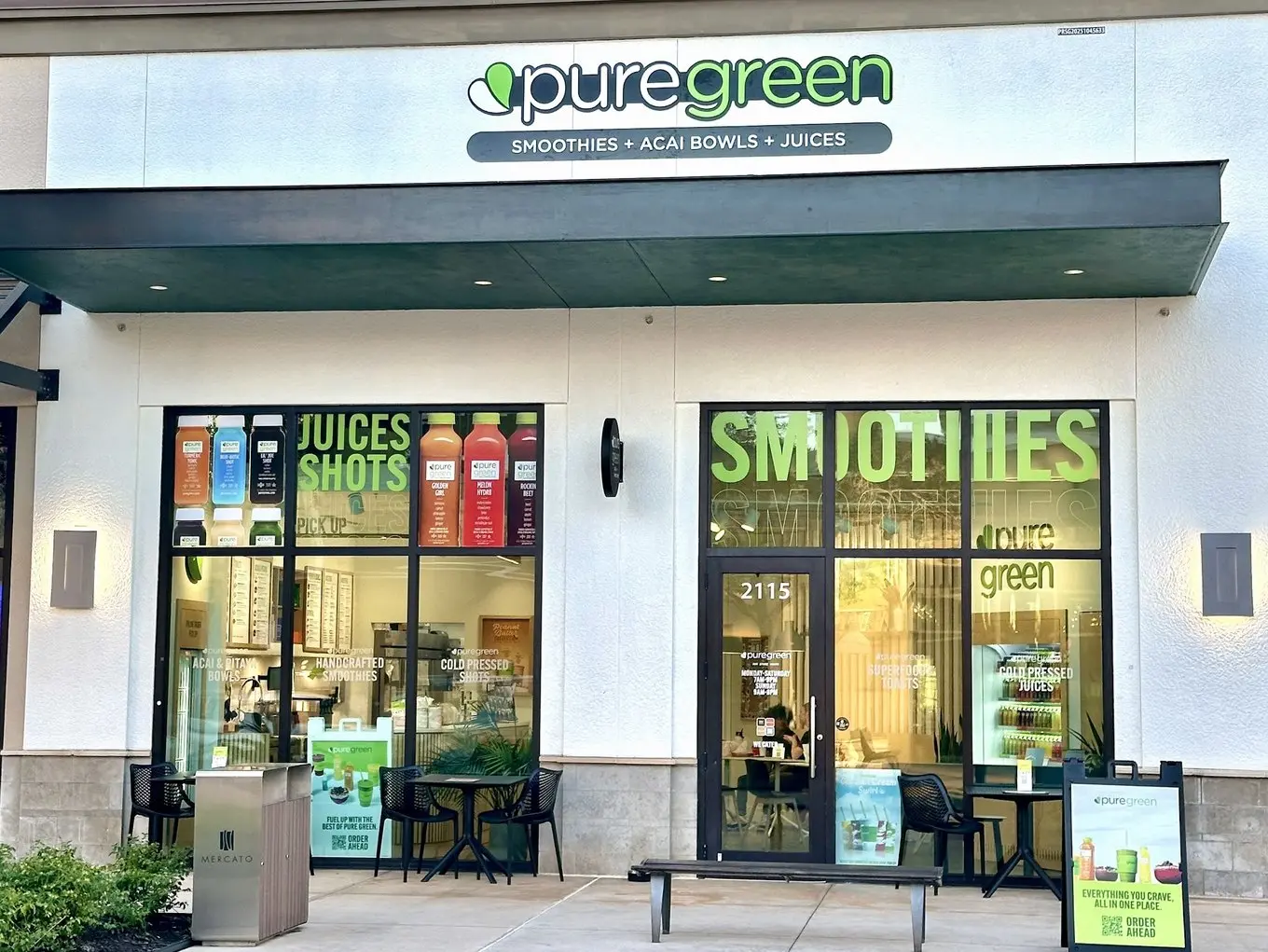 Pure Green North Naples storefront and patio seating at Mercato on Strada Place