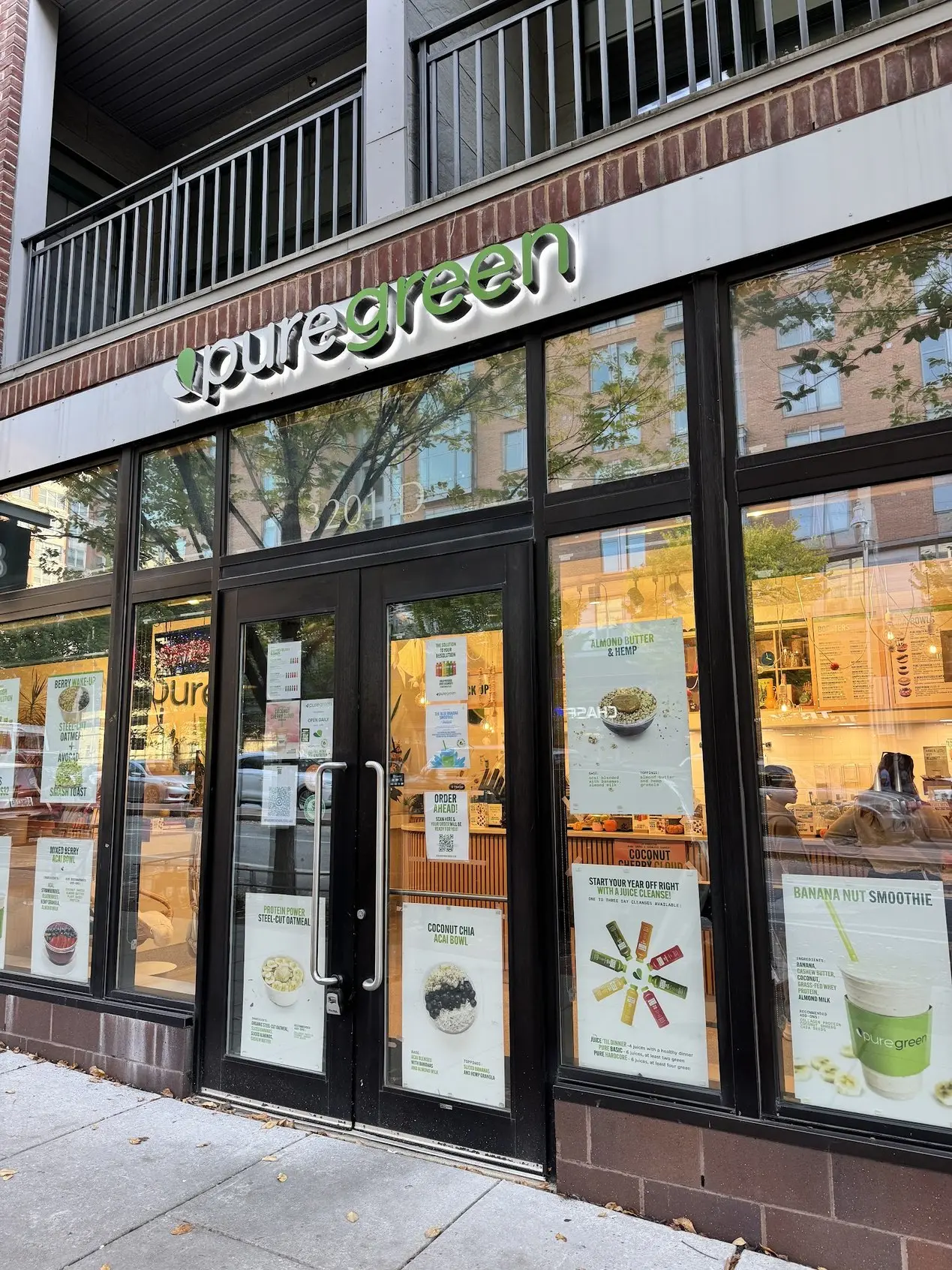 Pure Green Charles Village storefront and windows on St Paul Street in Baltimore