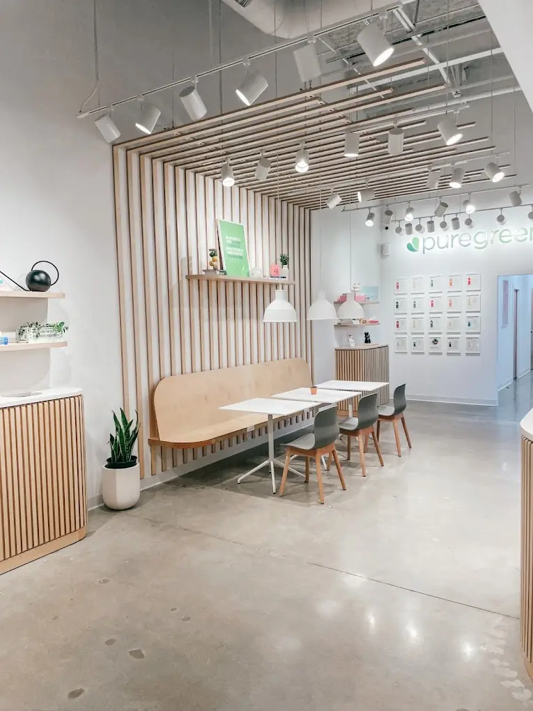 The bench seating and slatted wall inside Pure Green The Woodlands