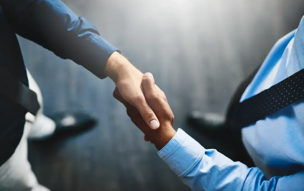 Closed deal shake hand