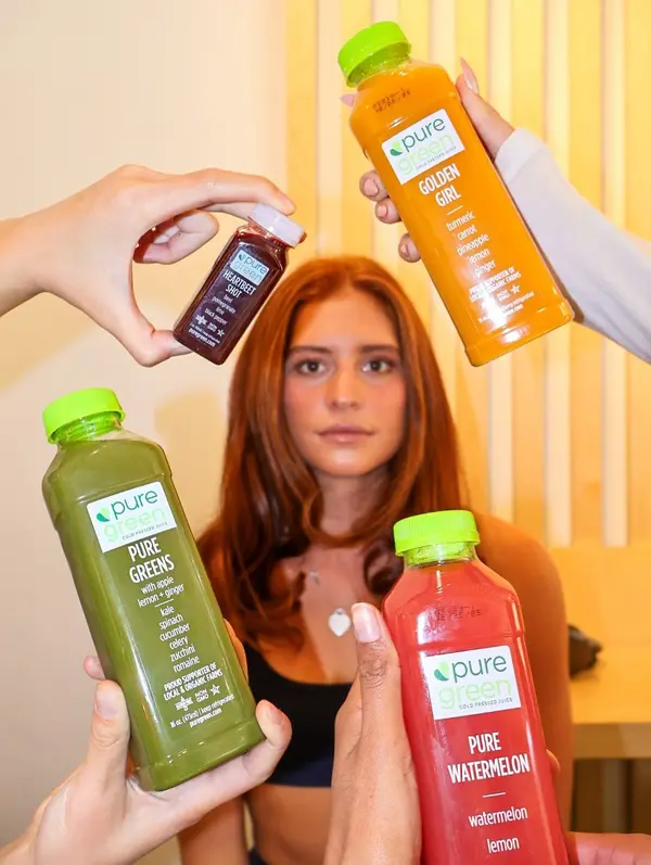 Cold-pressed juices and Pure Greens held up at Pure Green Madison