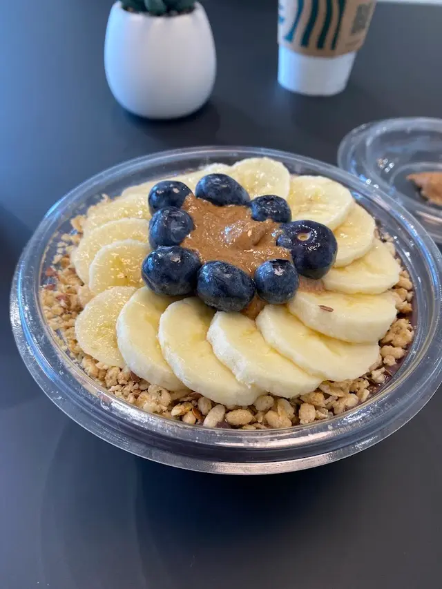 An acai bowl with banana, blueberries and almond butter at Pure Green Princeton