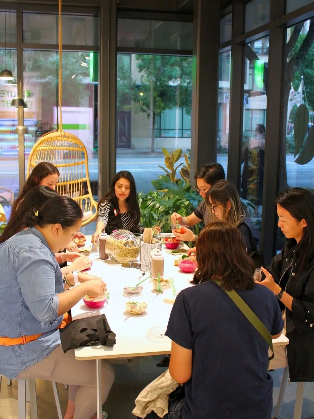 Guests gathered at the communal table inside Pure Green Downtown Seattle