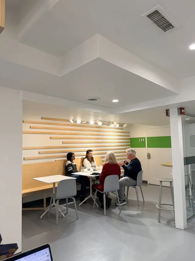 Guests at the tables in the seating area at Pure Green Dupont Circle