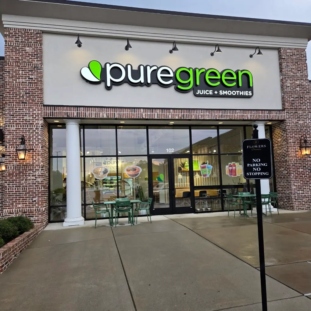 The shopfront of Pure Green Clayton with patio seating outside