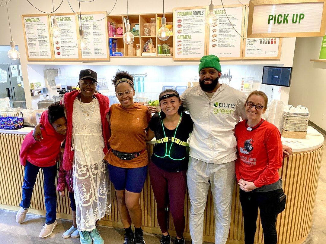 Pure Green Tempe team and guests at the pickup counter