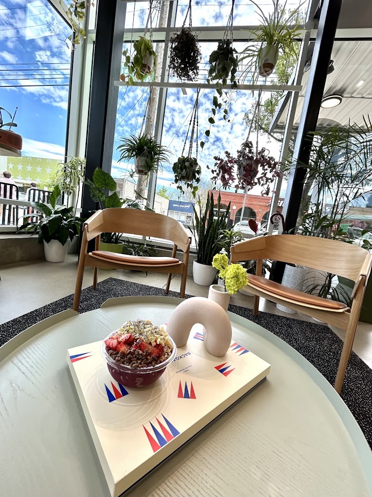An acai bowl on the low table in the window at Pure Green Portland