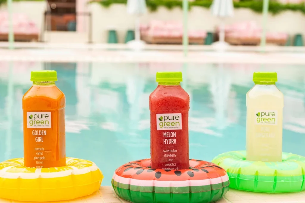 cold pressed juice by pure green near the pool menu for juice bar