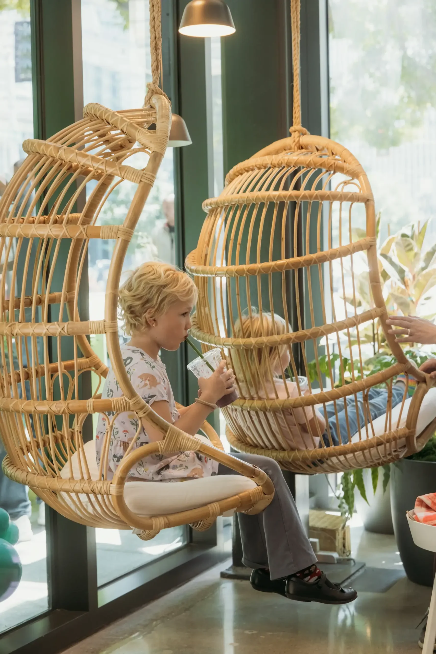 Kids sitting inside Pure Green store